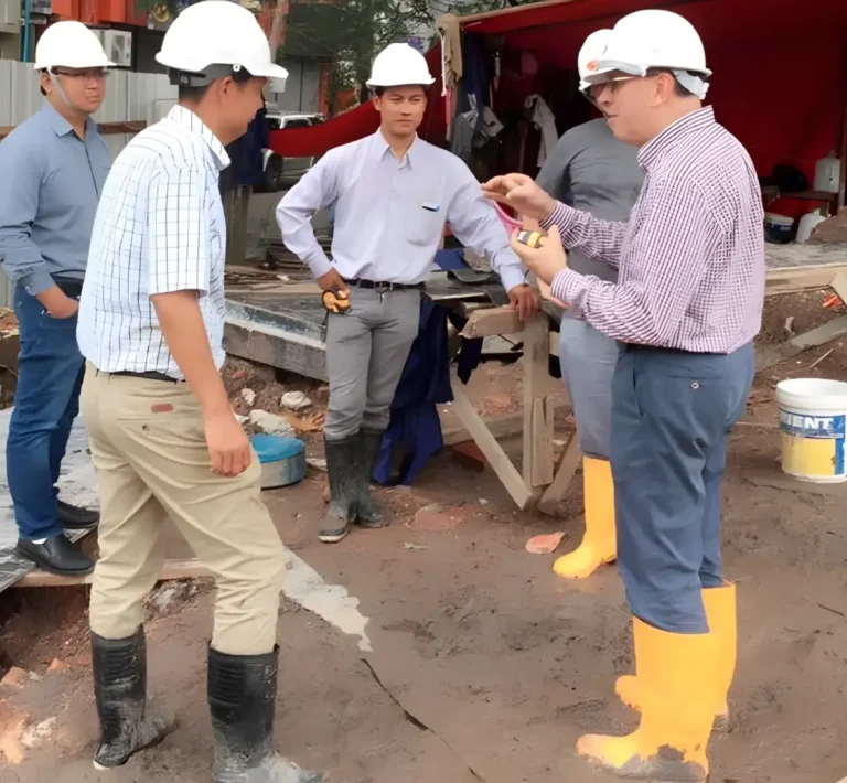 Pool consultant supervising Strand Hotel Myanmar construction with local team