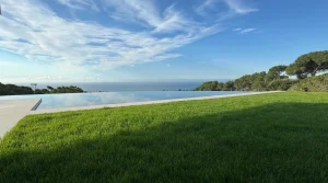 Seamless water surface merging with the sea on the Catalan coast